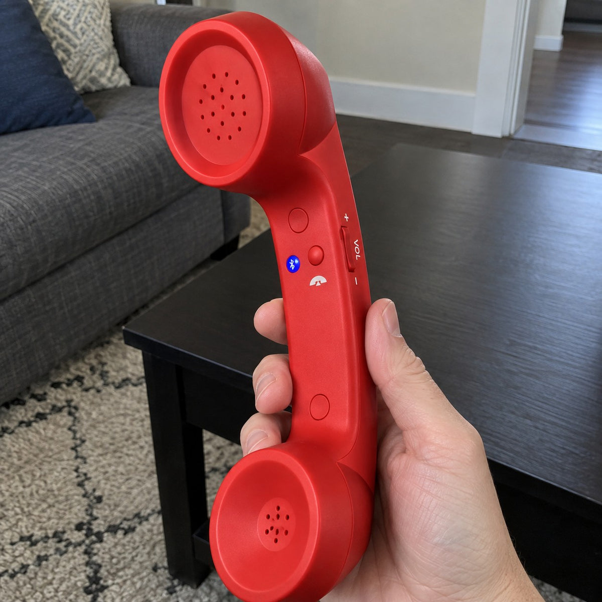 Customer photo: Red Novapix Bluetooth Retro Handset held in a living room